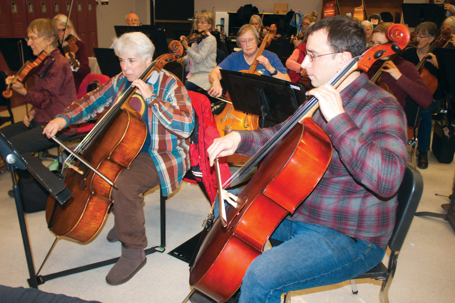 Members of the Port Townsend Symphony Orchestra rehearse in preparation for their Dec. 7 “Grand Finale” concert at 7:30 p.m. in the Chimacum Junior/Senior High School auditorium.